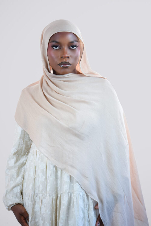 Woman wearing a beige modal hijab