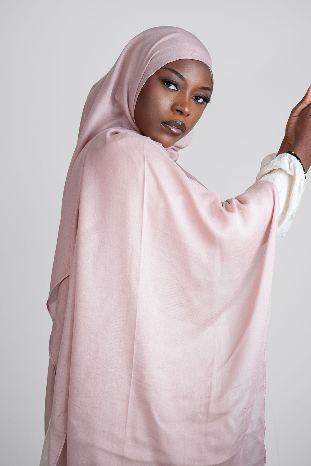 Woman wearing a light rose  hijab modal hijab
